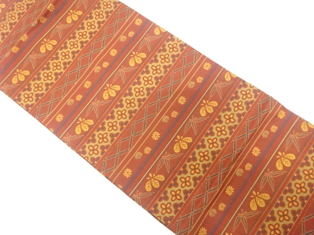 横段に菊・桐・笹模様織り出し　名古屋帯